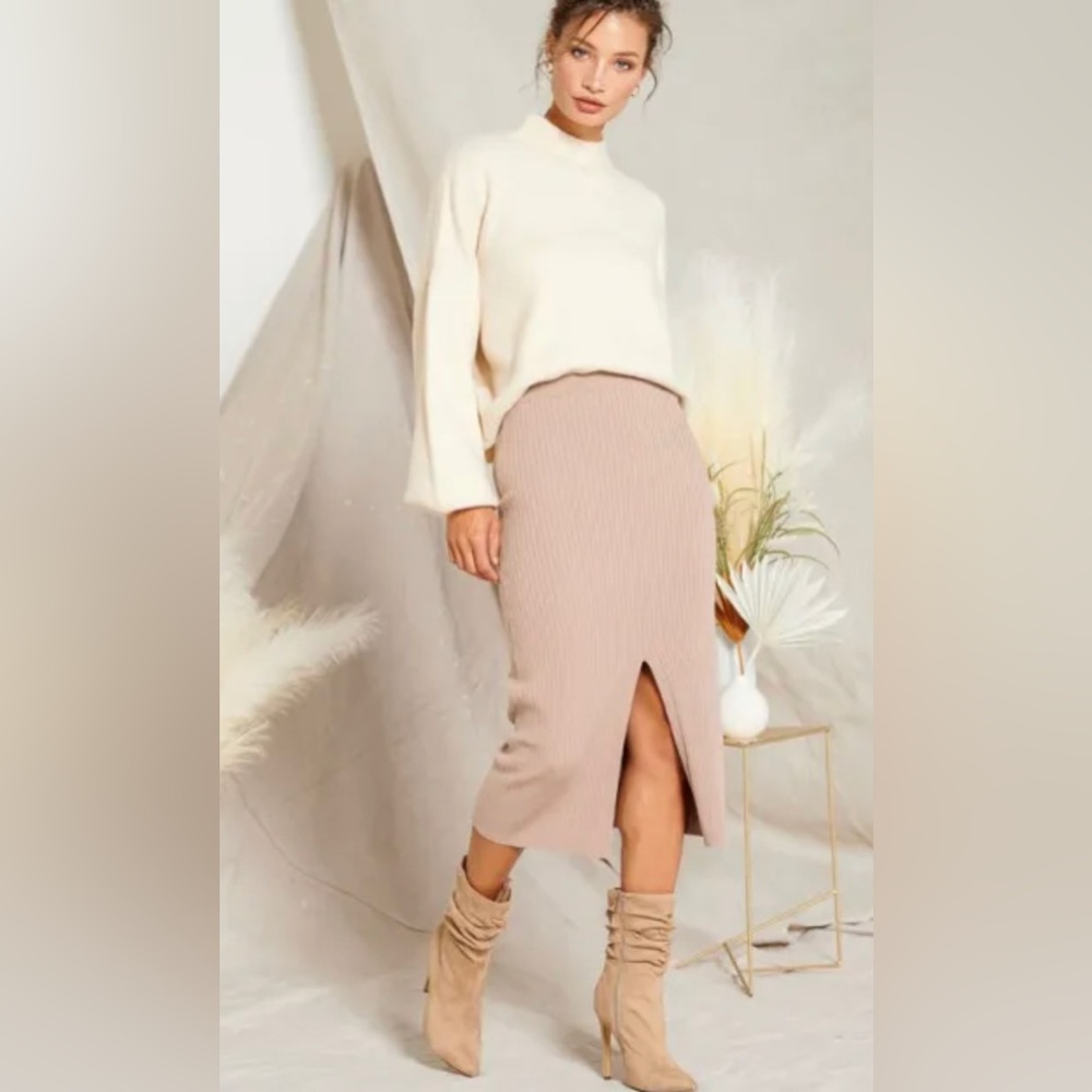 Ribbed Knit Midi. Soft and stretchy. Available in black and taupe.
